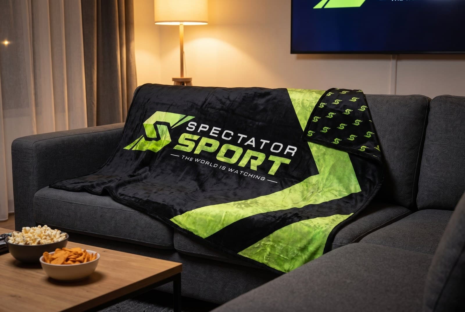 Spectator Sport blanket draped over a living room couch